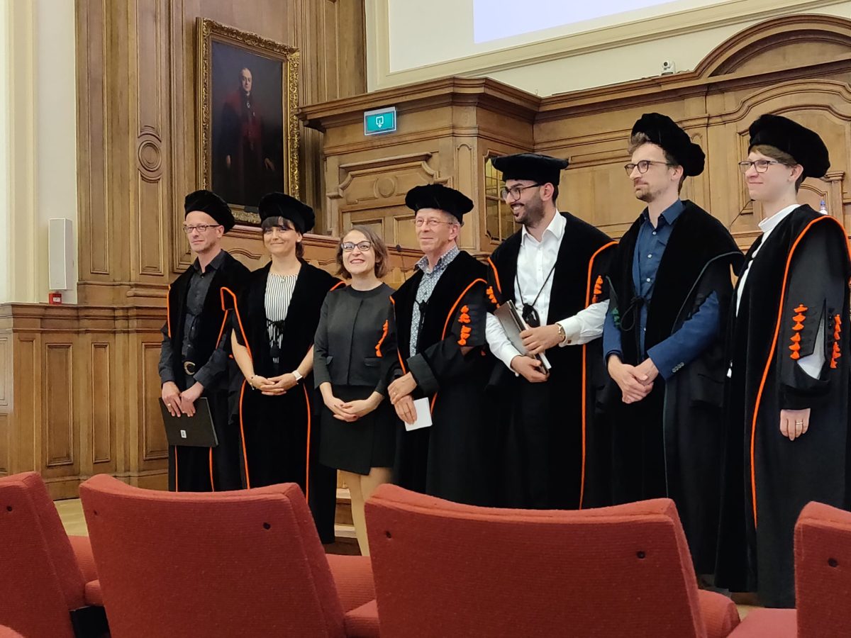 Özgün Ünver with the jury in academic gowns after her PhD defence at KU Leuven